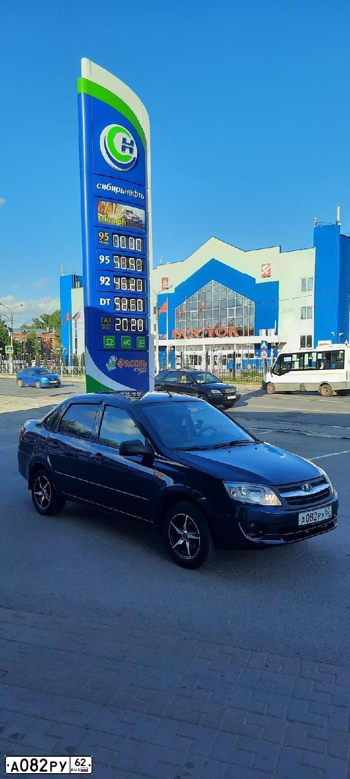 Фото автомобиля LADA 2190 GRANTA, 2013 — госномер А082РУ62. Цвет: СЕРО-СИНИЙ