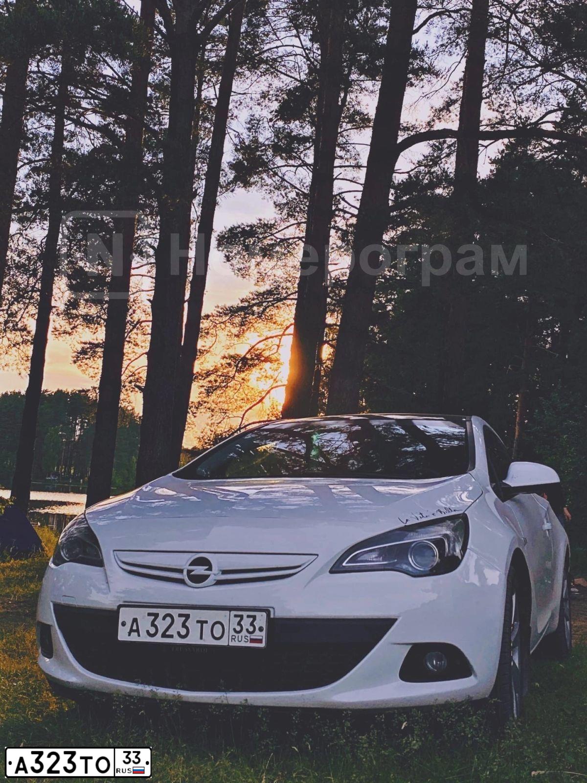 Фото автомобиля OPEL ASTRA, 2012 — госномер А323ТО33. Цвет: Белый