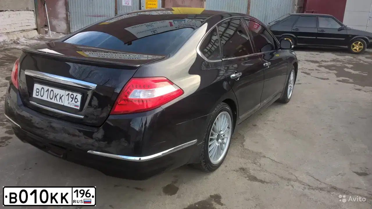 Фото автомобиля NISSAN TEANA, 2009 — госномер В010КК196. Цвет: ЧЕРНЫЙ