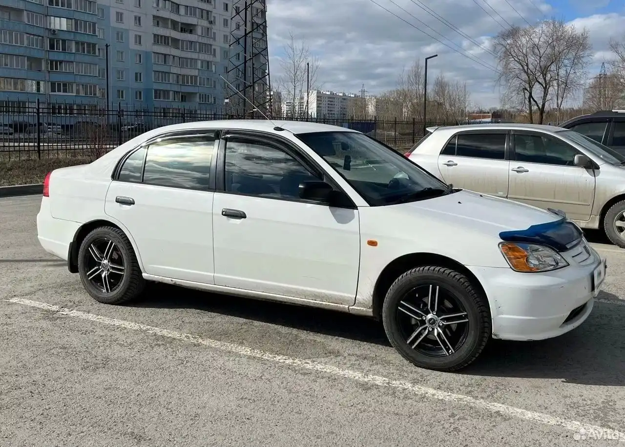 Фото автомобиля HYUNDAI SOLARIS, 2016 — госномер Е345ЕА154. Цвет: Белый