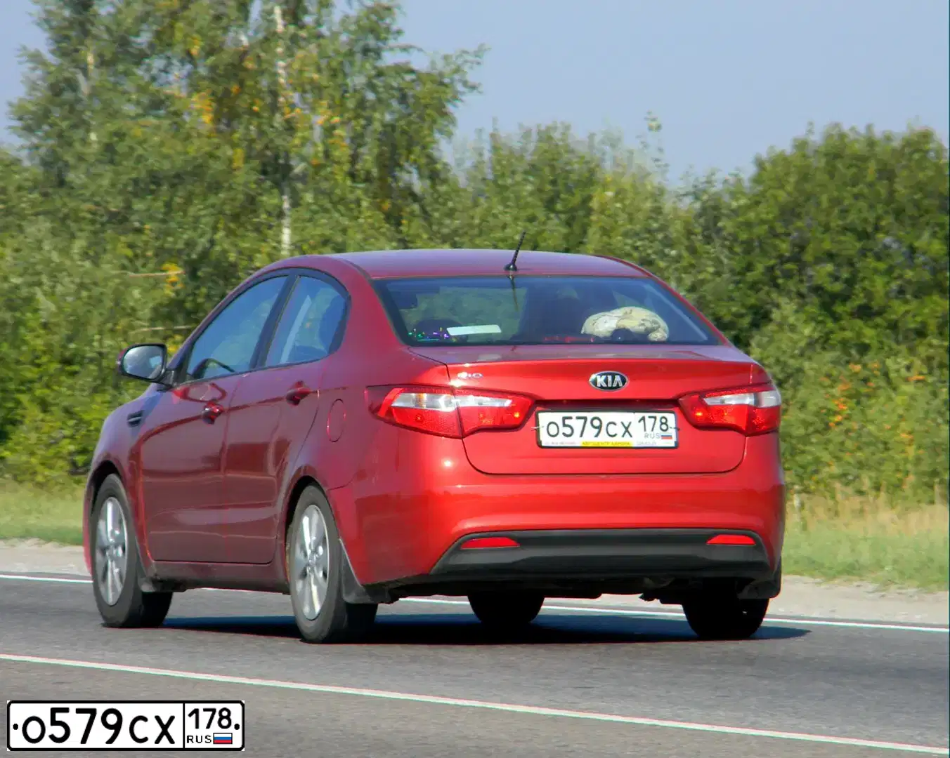 Фото автомобиля KIA RIO, 2013 — госномер С153ОН198. Цвет: Красный