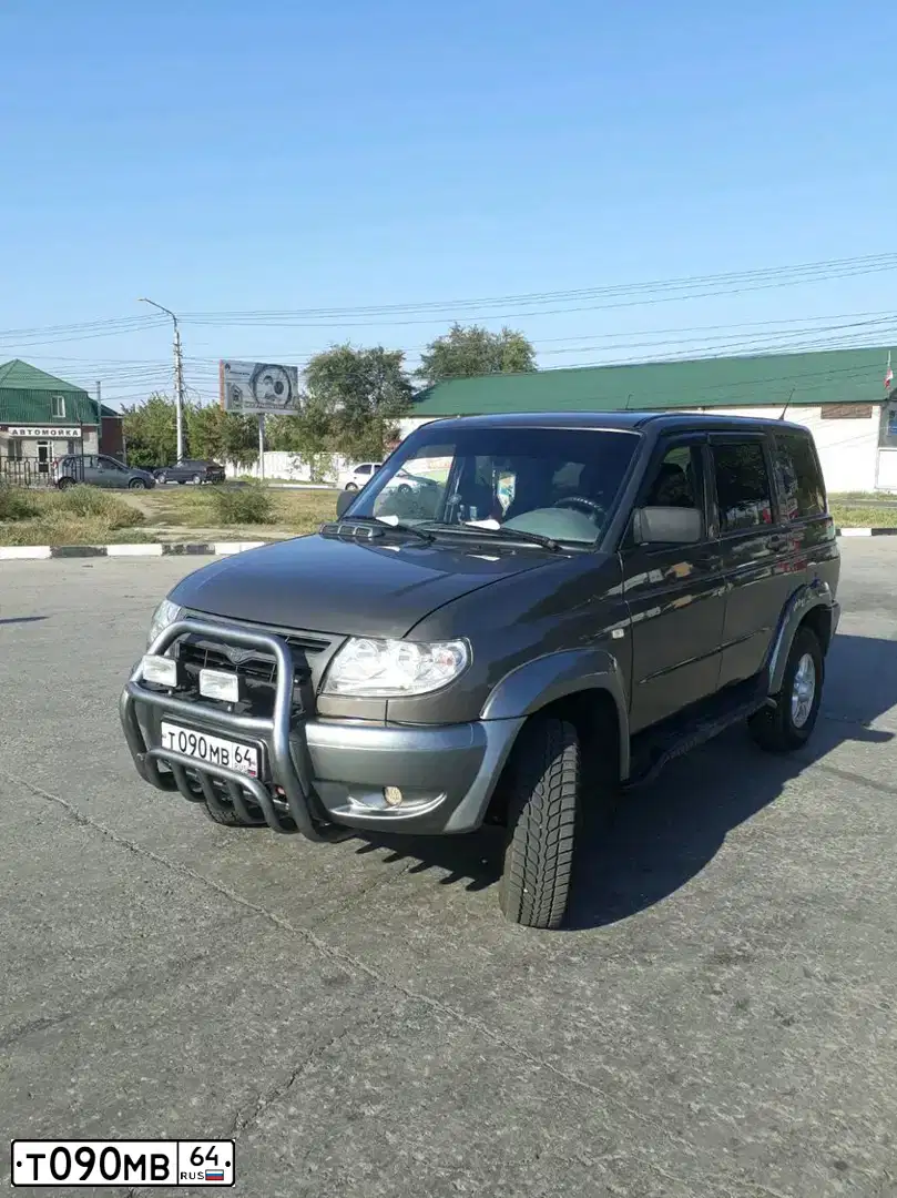 Фото автомобиля UAZ 3163 PATRIOT, 2007 — госномер Т090МВ64. Цвет: Ричмо-металлик