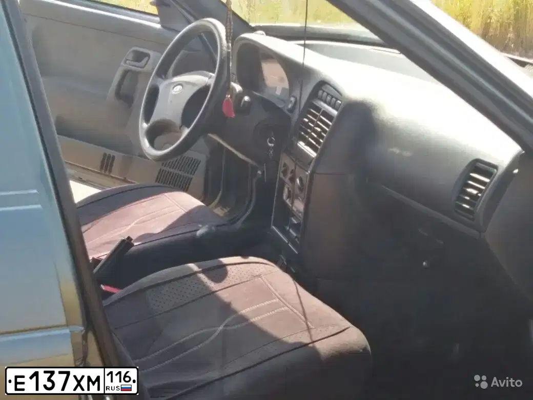 Фото автомобиля LADA 2112, 2008 — госномер Е137ХМ116. Цвет: СЕРО-СИНЕ-ЗЕЛЕНЫЙ