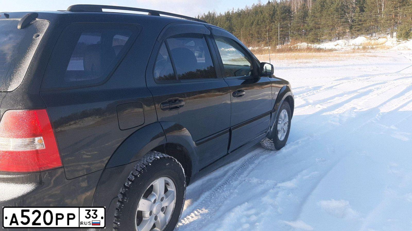 Фото автомобиля KIA SORENTO, 2007 — госномер Н678СК196. Цвет: Черный графит (черный)