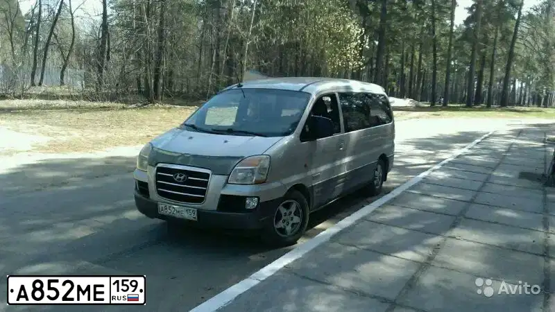 Фото автомобиля HYUNDAI H 1/H 100/STAREX, 2006 — госномер Е343ТВ21. Цвет: СЕРЫЙ ТЕМНО-СЕРЫЙ