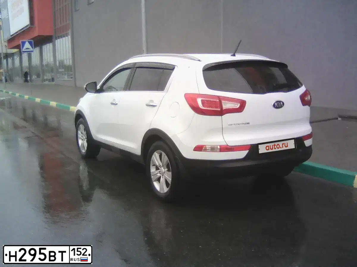 Фото автомобиля KIA SPORTAGE, 2014 — госномер М831ЕТ21. Цвет: Белый