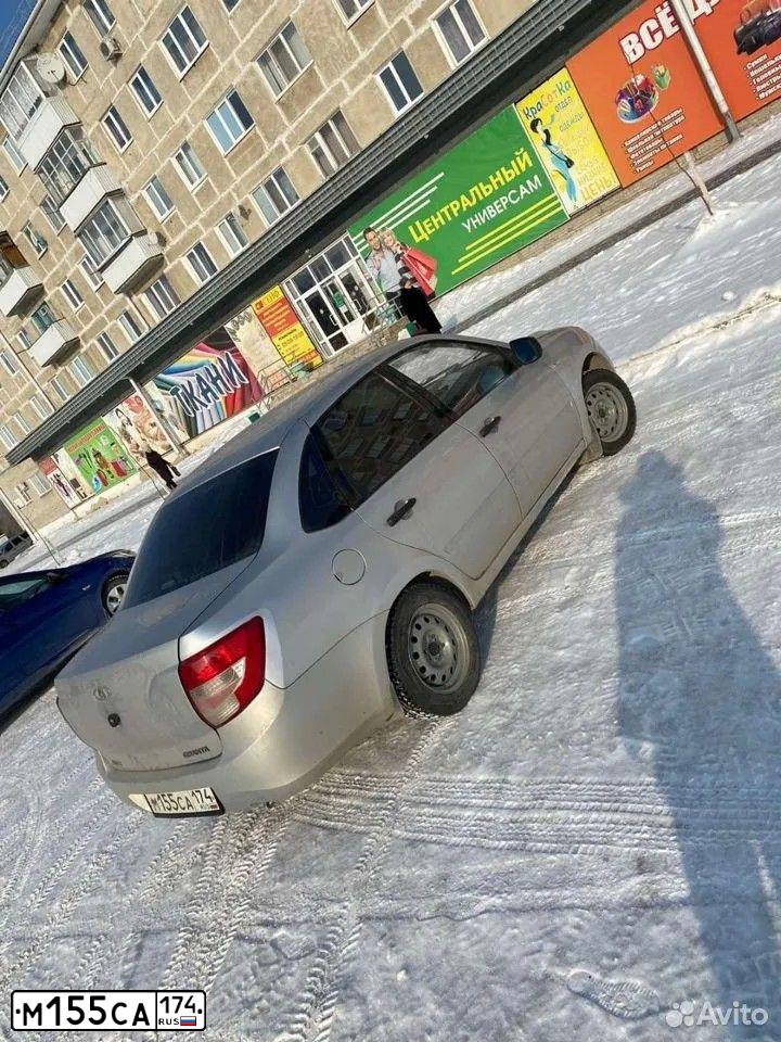 Фото автомобиля LADA 2190 GRANTA, 2012 — госномер М155СА174. Цвет: Серебристый
