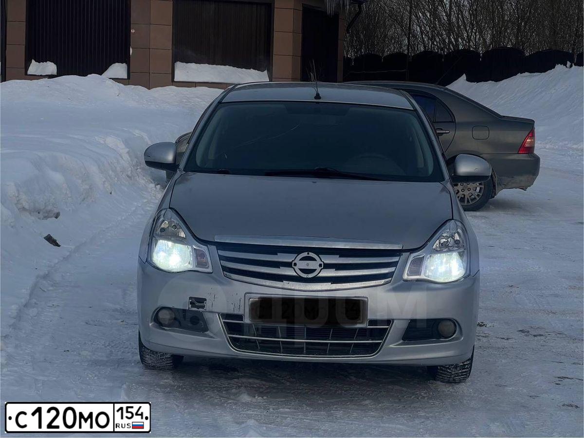 Фото автомобиля NISSAN ALMERA /AVTOVAZ/, 2013 — госномер С120МО154. Цвет: Серебристый