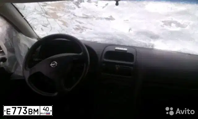 Фото автомобиля OPEL ASTRA, 1999 — госномер Е773ВМ40. Цвет: серебристый