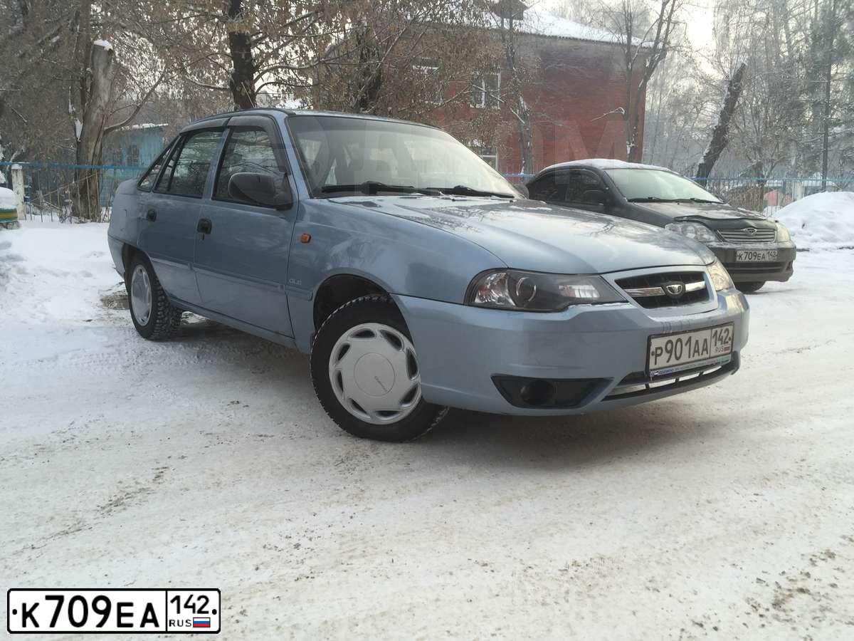 Фото автомобиля TOYOTA COROLLA, 2004 — госномер К709ЕА142. Цвет: Серый