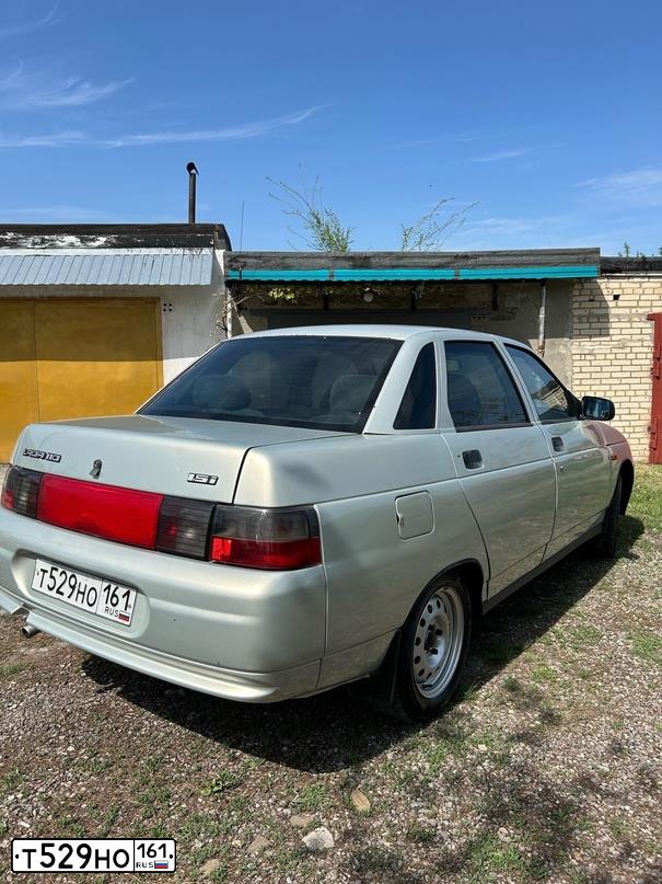 Фото автомобиля LADA 2110 LADA, 2004 — госномер Т529НО161. Цвет: МОЛОЧНО-БЕЛЫЙ СЕРЕБРИСТЫЙ