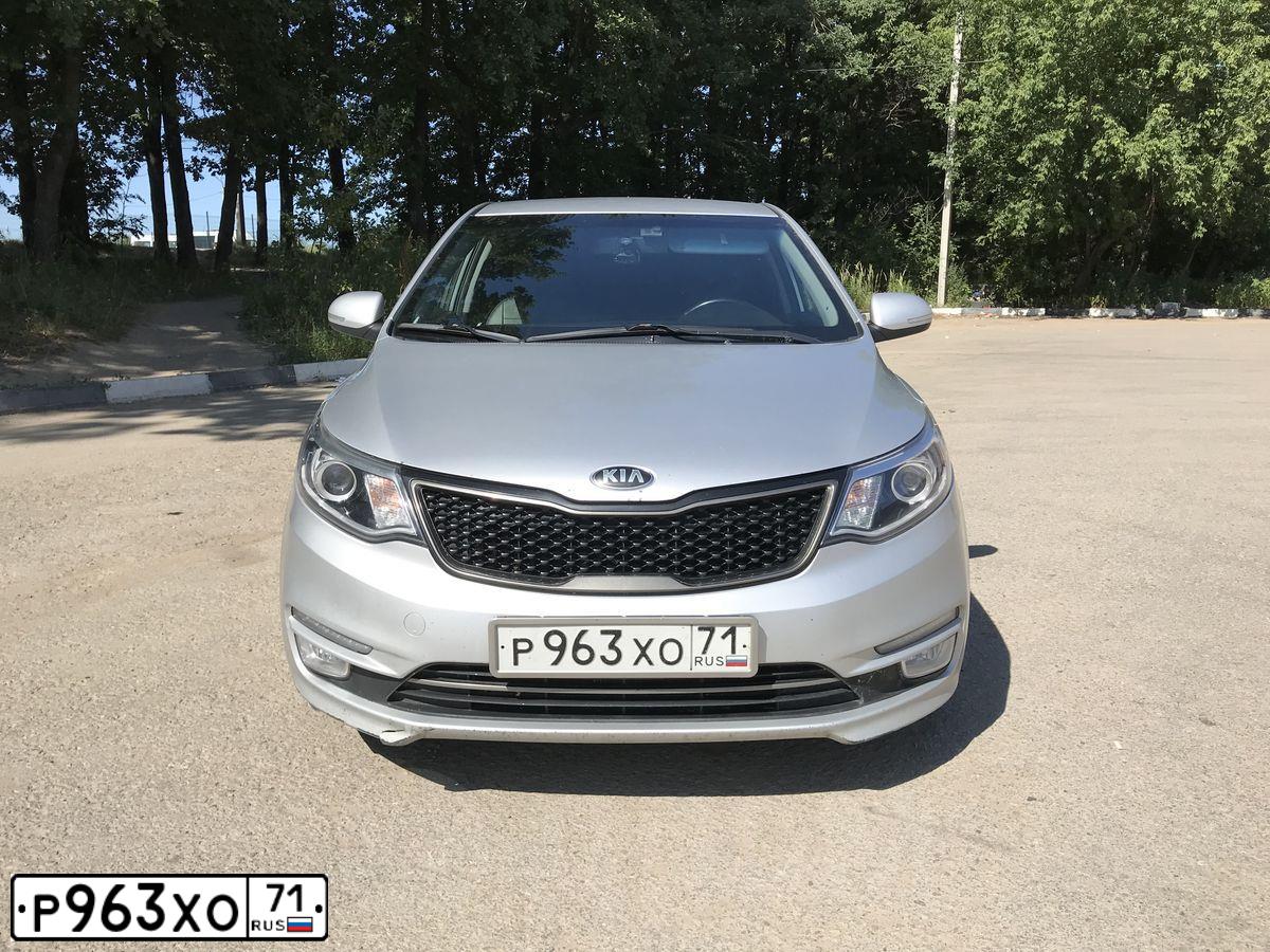 Фото автомобиля KIA RIO, 2015 — госномер Р963ХО71. Цвет: Серебристый