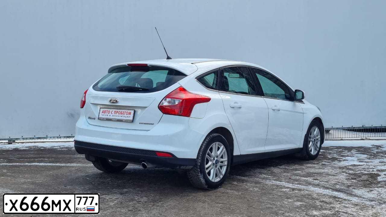 Фото автомобиля FORD FOCUS, 2014 — госномер Х666МХ777. Цвет: Белый