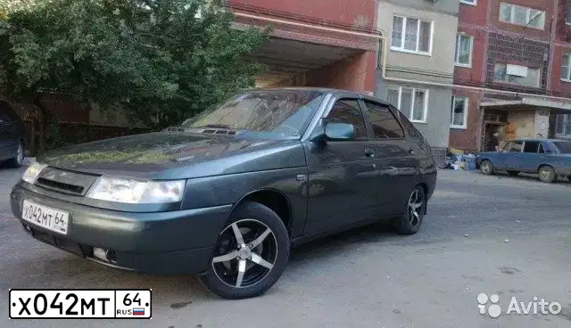 Фото автомобиля LADA 2112 LADA, 2006 — госномер Р769МХ761. Цвет: СЕРО-СИНЕ-ЗЕЛЕНЫЙ