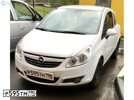 Фото автомобиля OPEL CORSA, 2008 — госномер М367КХ07. Цвет: Белый