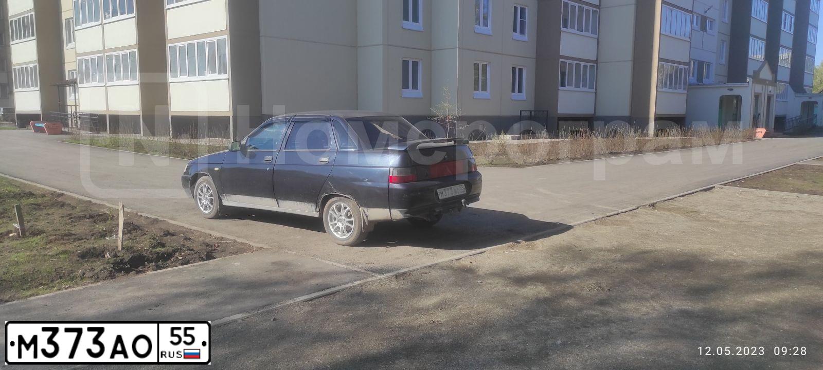 Фото автомобиля LADA 2110, 2002 — госномер М373АО55. Цвет: ЧЕРНЫЙ