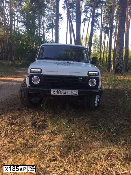 Фото автомобиля LADA 2121 NIVA, 2007 — госномер Х185АР163. Цвет: ЯРКО-БЕЛЫЙ