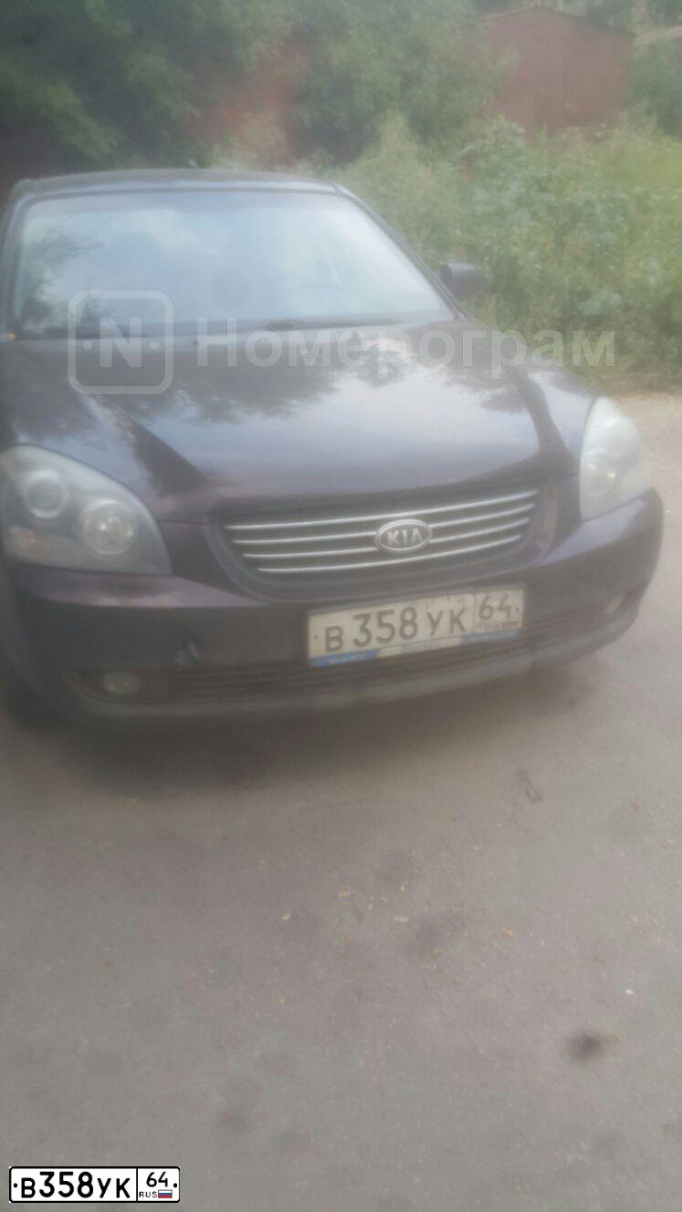 Фото автомобиля KIA КИА GЕ, 2008 — госномер В358УК64. Цвет: ТЕМНО КРАСНЫЙ