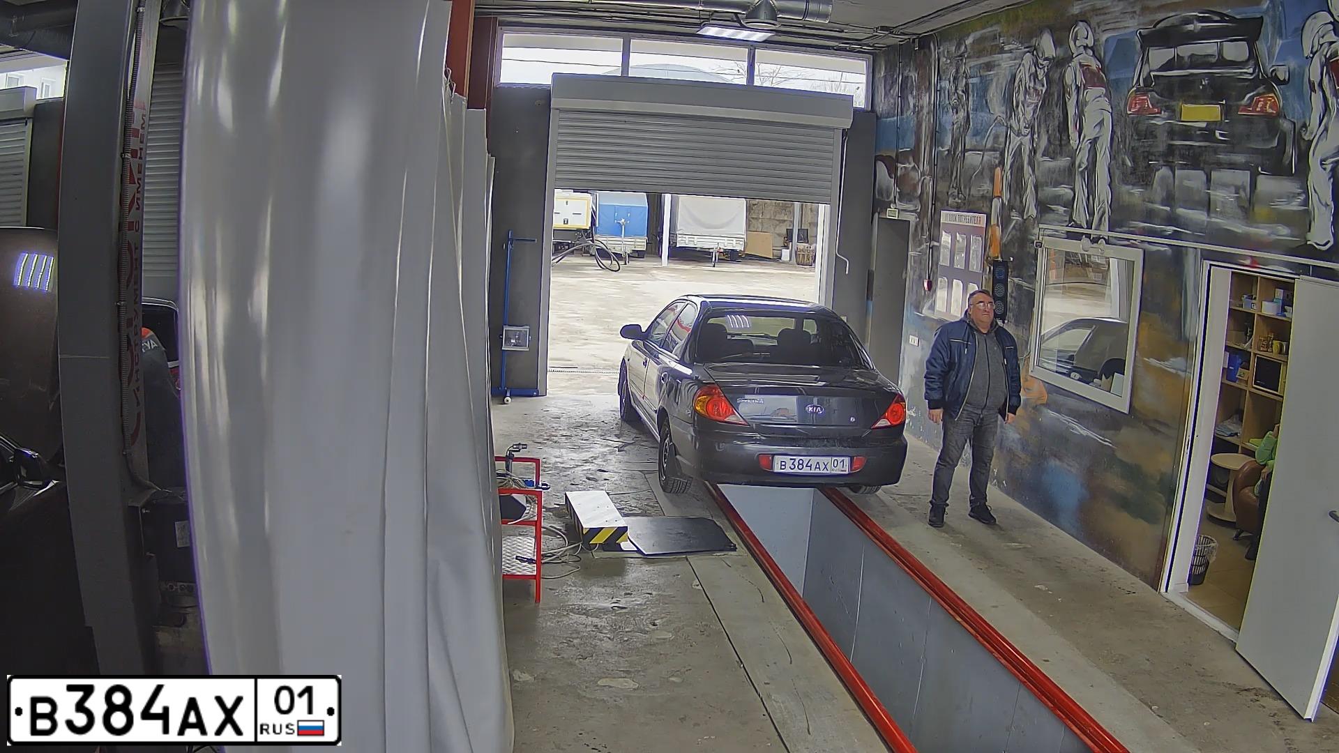 Фото автомобиля KIA SPECTRA, 2006 — госномер В479КА01. Цвет: ЧЕРНЫЙ