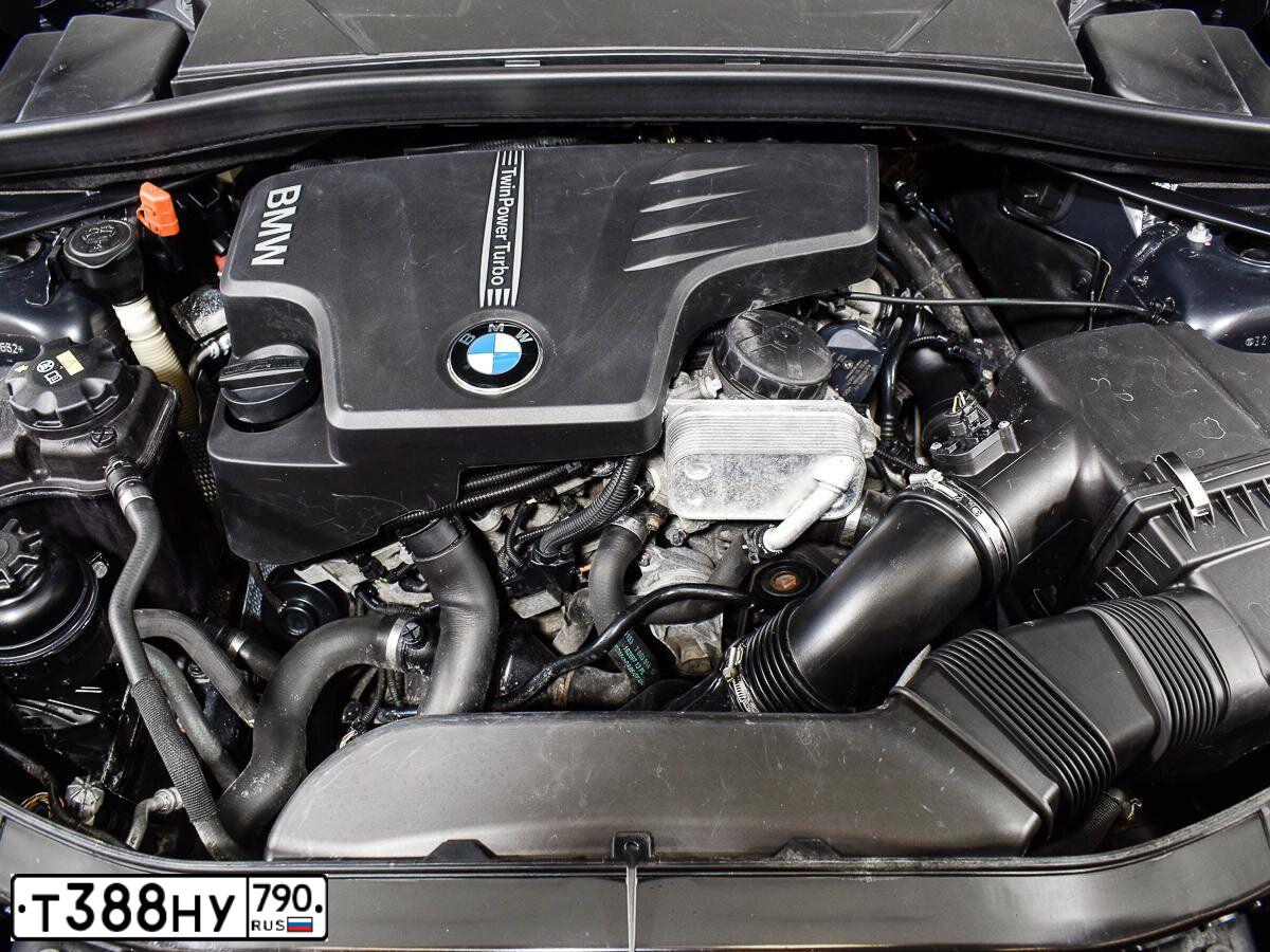 Фото автомобиля BMW X1, 2012 — госномер Т388НУ790. Цвет: ЧЕРНЫЙ