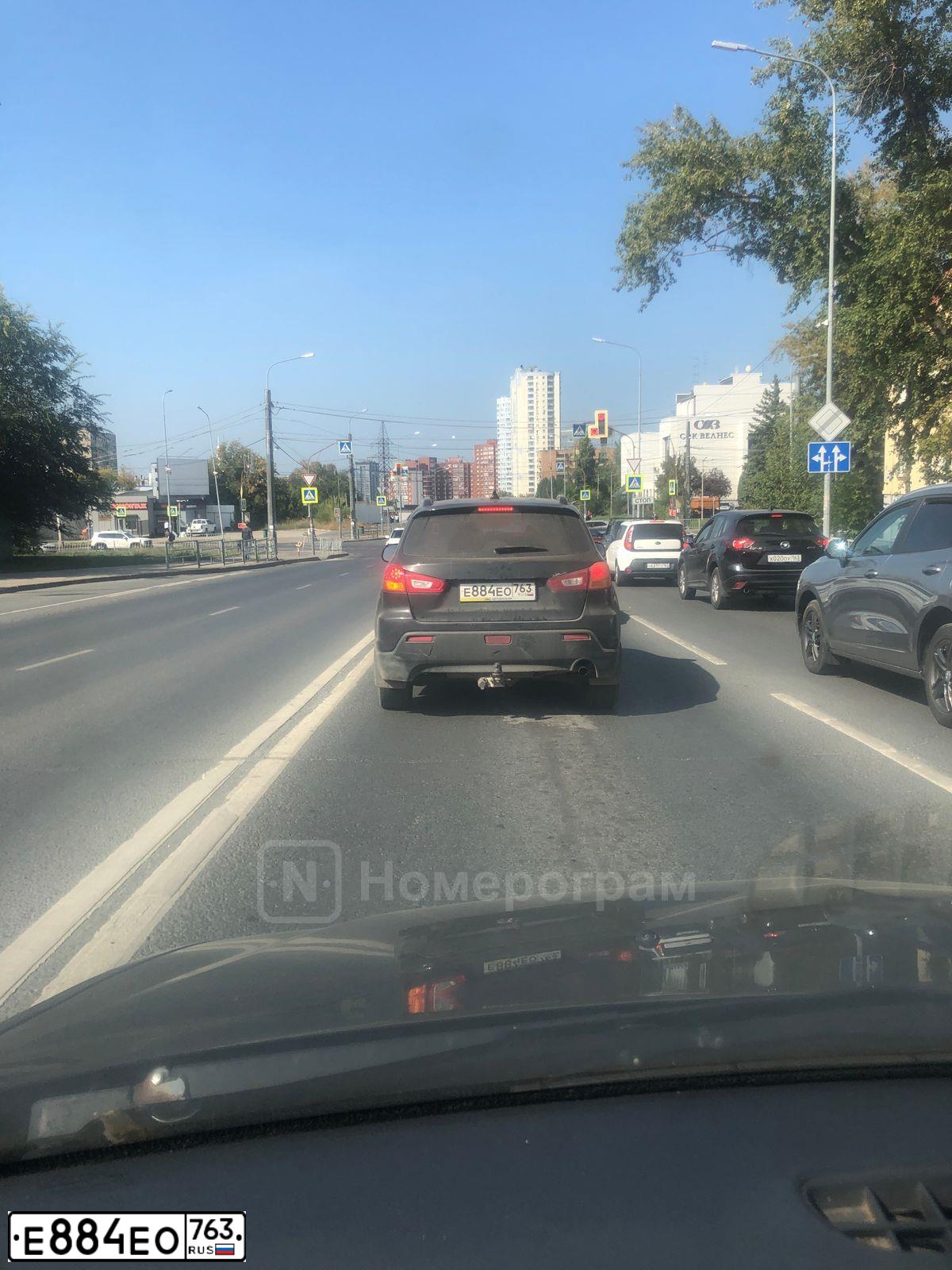 Фото автомобиля MITSUBISHI ASX, 2011 — госномер Е884ЕО763. Цвет: ЧЕРНЫЙ