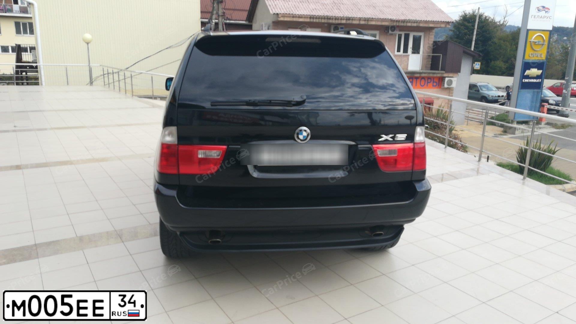 Фото автомобиля BMW X5, 2004 — госномер М005ЕЕ34. Цвет: ЧЕРНЫЙ