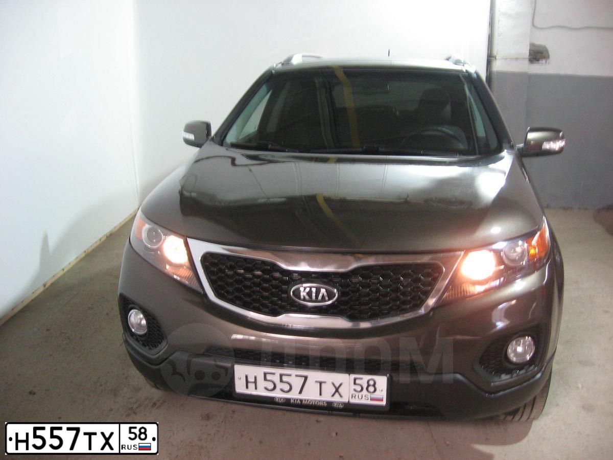 Фото автомобиля KIA SORENTO, 2011 — госномер Н464НН64. Цвет: Коричневый