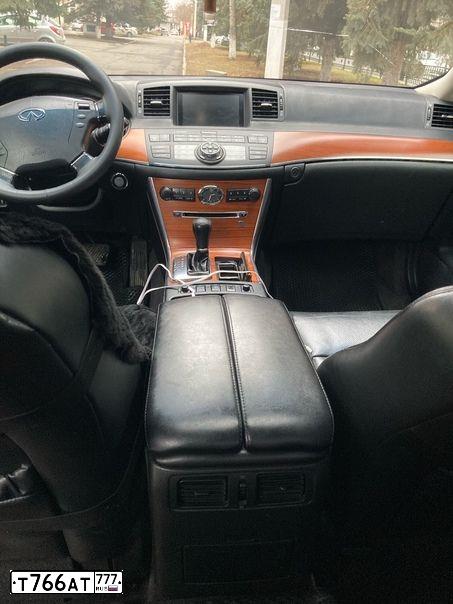 Фото автомобиля INFINITI M, 2006 — госномер Е888СХ177. Цвет: ЧЕРНЫЙ