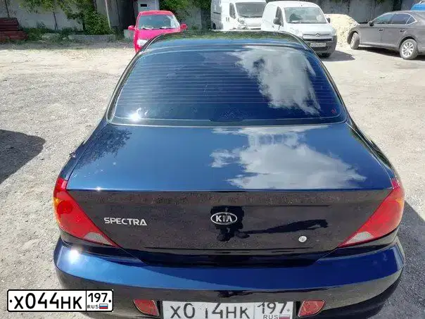 Фото автомобиля BMW 116I, 2011 — госномер Т977РЕ761. Цвет: Белый
