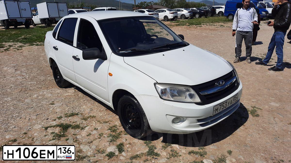 Фото автомобиля VOLKSWAGEN POLO, 2015 — госномер Н106ЕМ136. Цвет: Белый