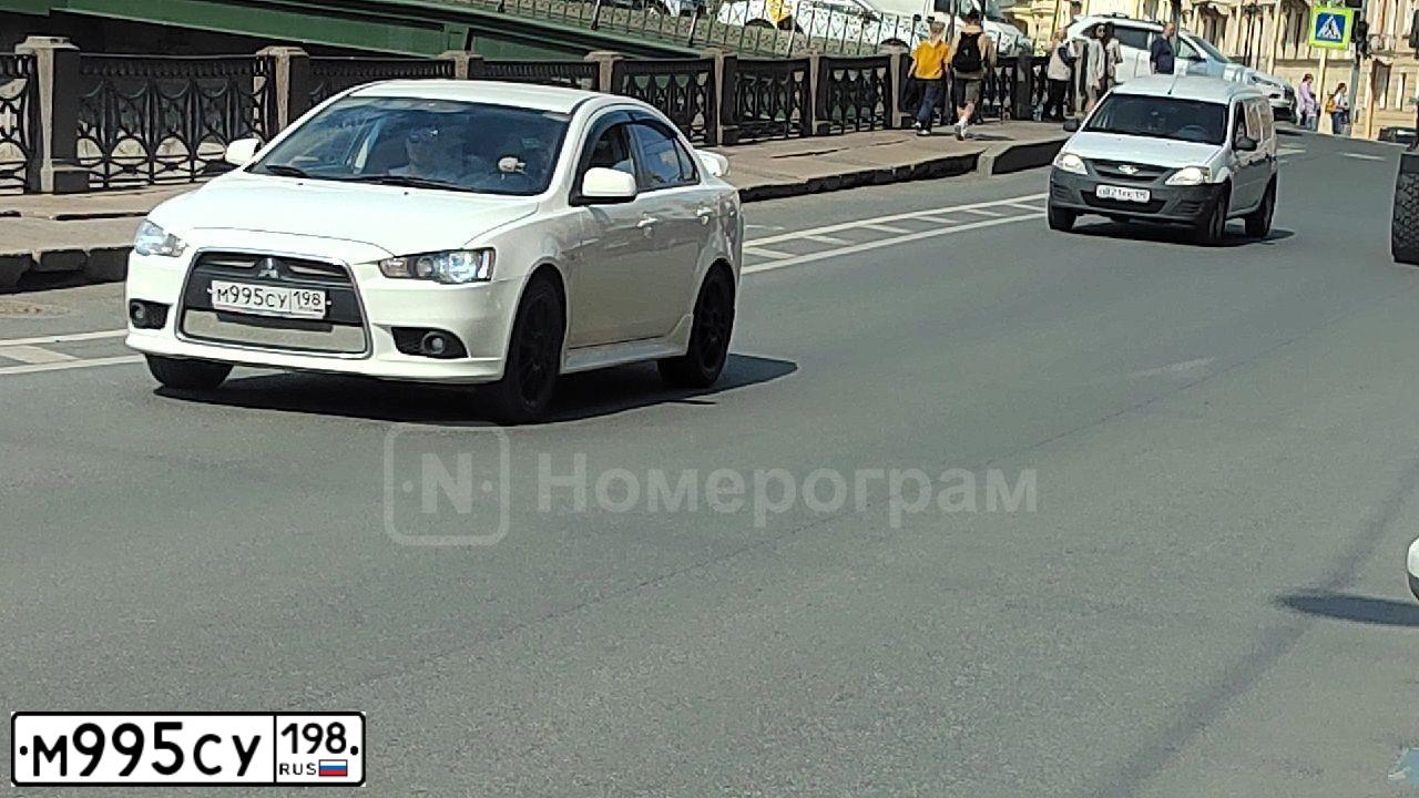 Фото автомобиля MITSUBISHI LANCER, 2014 — госномер М995СУ198. Цвет: Белый