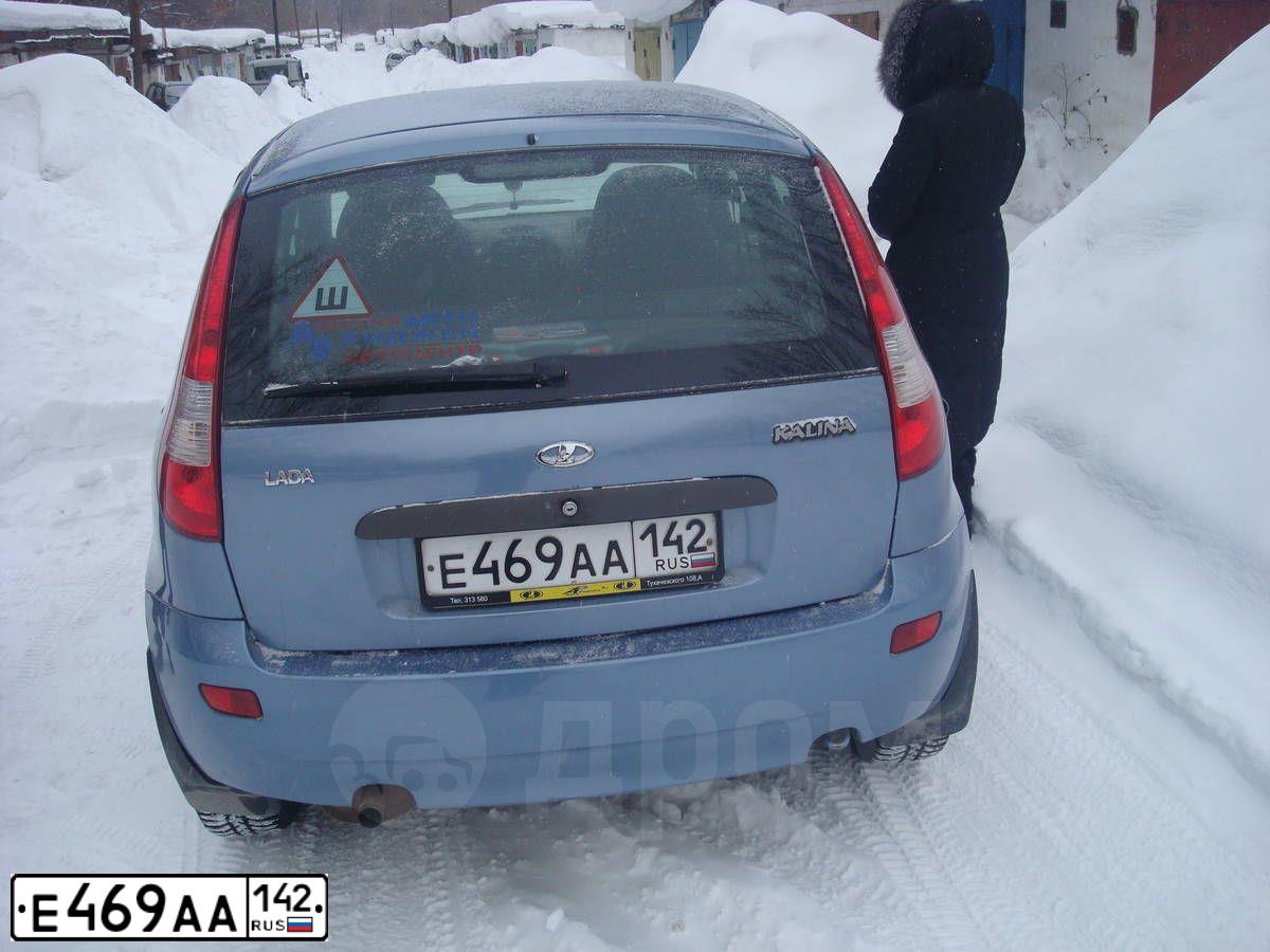 Фото автомобиля LADA 1119 KALINA, 2007 — госномер Е469АА142. Цвет: СЕРО-СИНИЙ