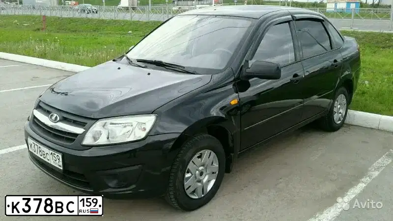 Фото автомобиля LADA 2190 GRANTA, 2015 — госномер К918ТМ159. Цвет: ЧЕРНЫЙ