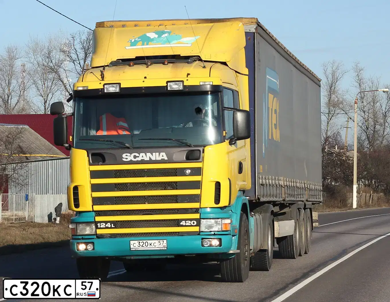 Фото автомобиля SCANIA SERIE R /4X2/, 2000 — госномер О634КА196. Цвет: ЖЁЛТЫЙ