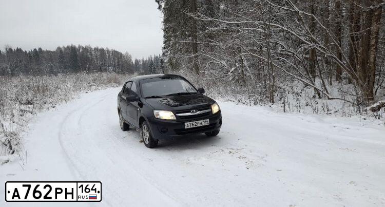 Фото автомобиля LADA 2190 GRANTA, 2012 — госномер С248ВО790. Цвет: Сине-Черный