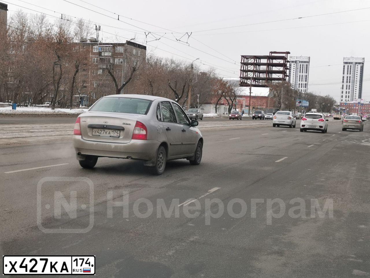 Фото автомобиля LADA 2112 LADA, 2006 — госномер Х427АК174. Цвет: СРЕДНИЙ СЕРО-ЗЕЛЕНЫЙ МЕТ.