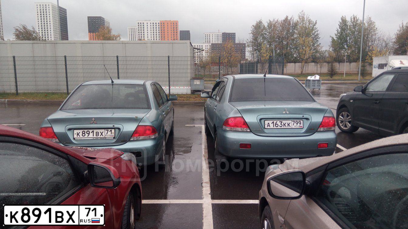Фото автомобиля MITSUBISHI LANCER, 2006 — госномер К891ВХ71. Цвет: СВЕТЛО-СЕРО-ЗЕЛЕНЫЙ