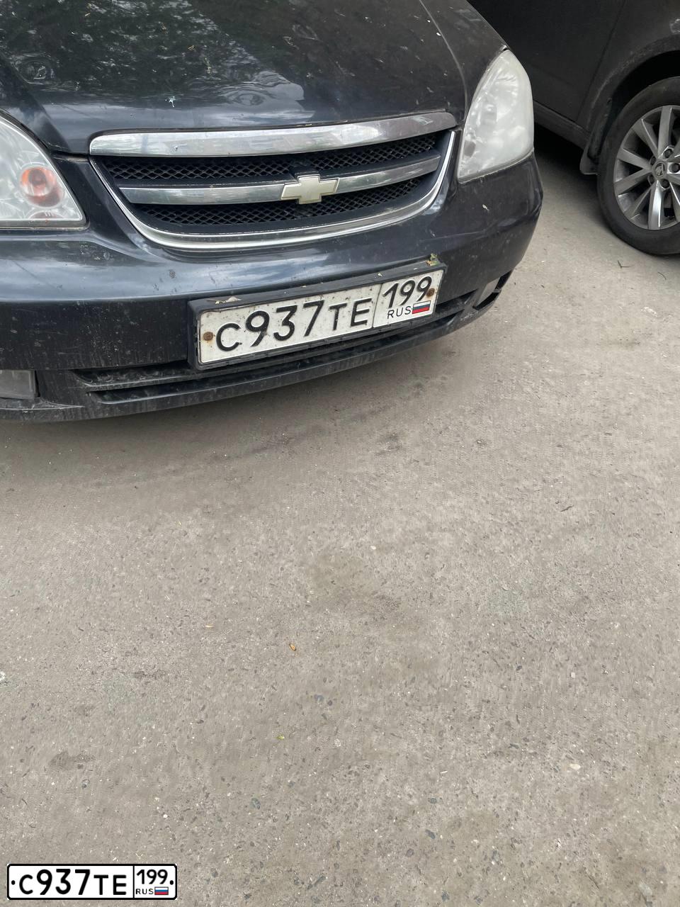Фото автомобиля CHEVROLET LACETTI, 2009 — госномер С937ТЕ199. Цвет: ЧЕРНЫЙ