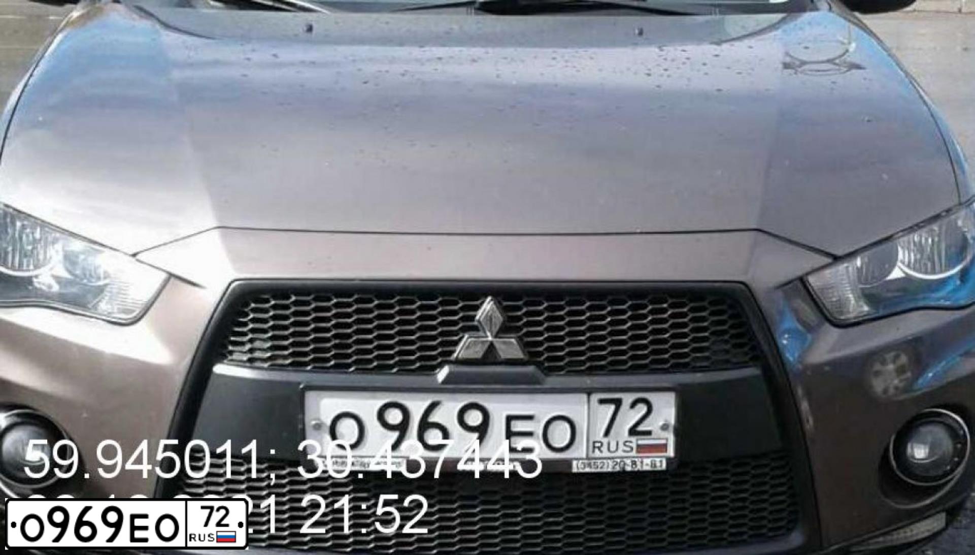 Фото автомобиля MITSUBISHI OUTLANDER, 2011 — госномер О969ЕО72. Цвет: КОРИЧНЕВЫЙ