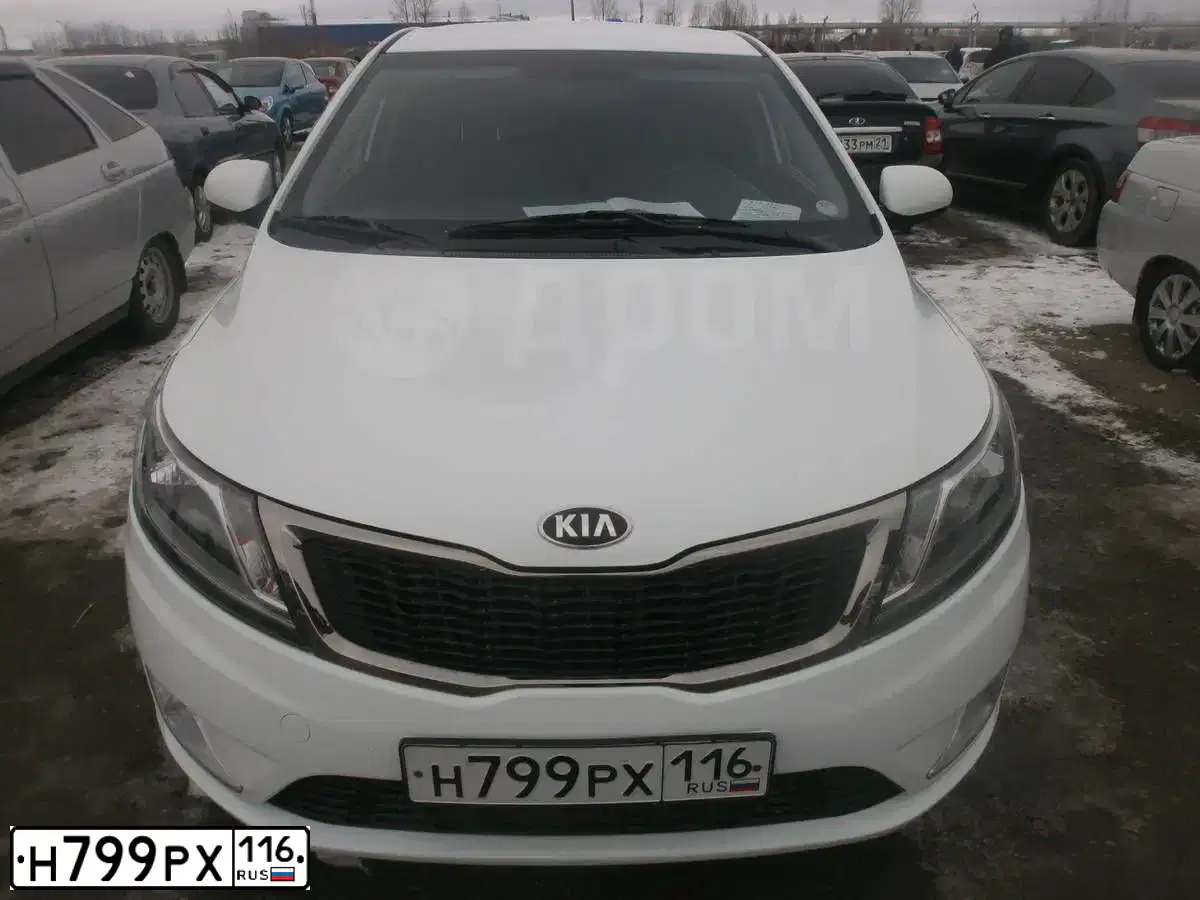 Фото автомобиля KIA RIO, 2013 — госномер Р513ЕО58. Цвет: БЕЛЫЙ