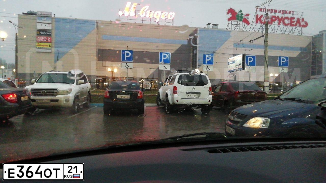 Фото автомобиля CHEVROLET LACETTI, 2011 — госномер Е364ОТ21. Цвет: ЧЕРНЫЙ
