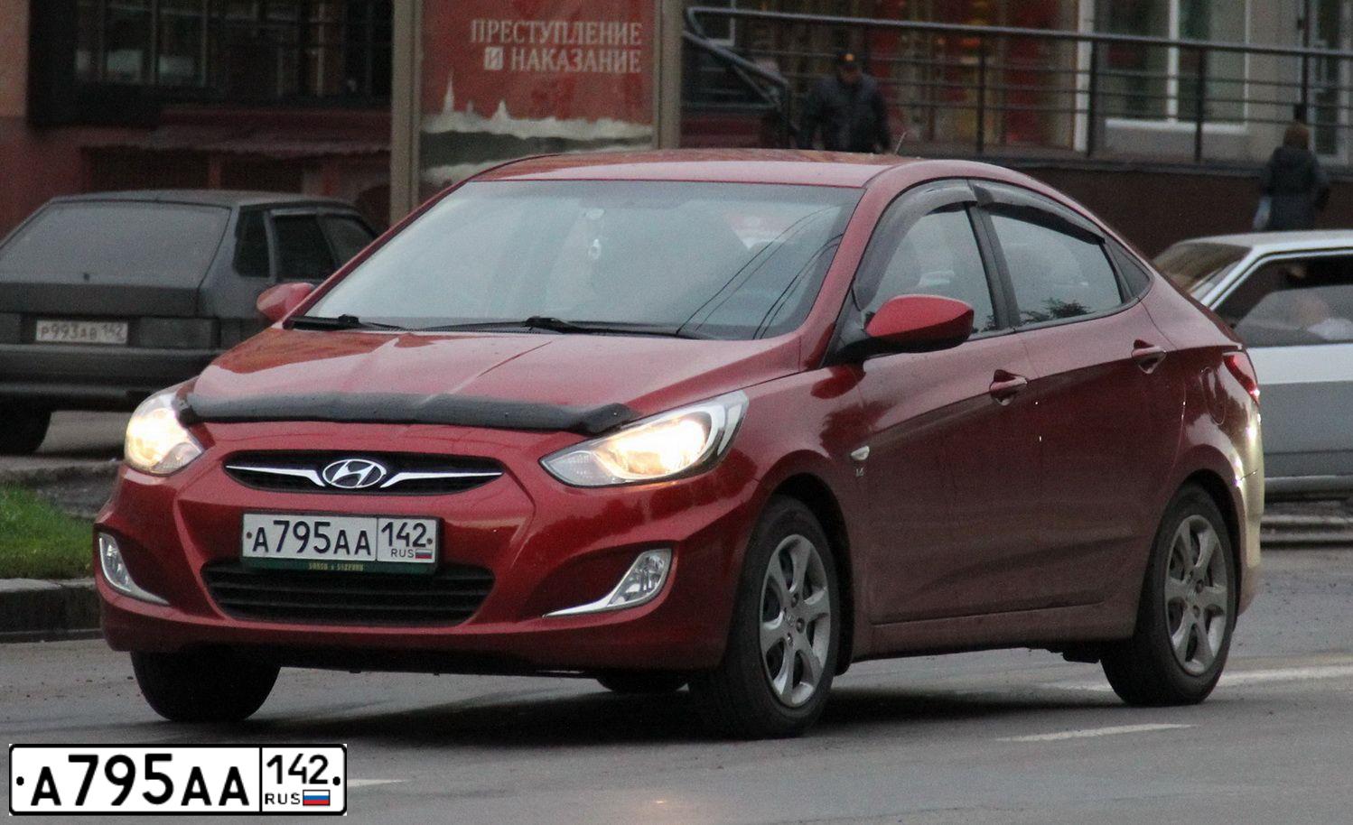 Фото автомобиля HYUNDAI SOLARIS, 2011 — госномер А795АА142. Цвет: КРАСНЫЙ ГРАНАТ