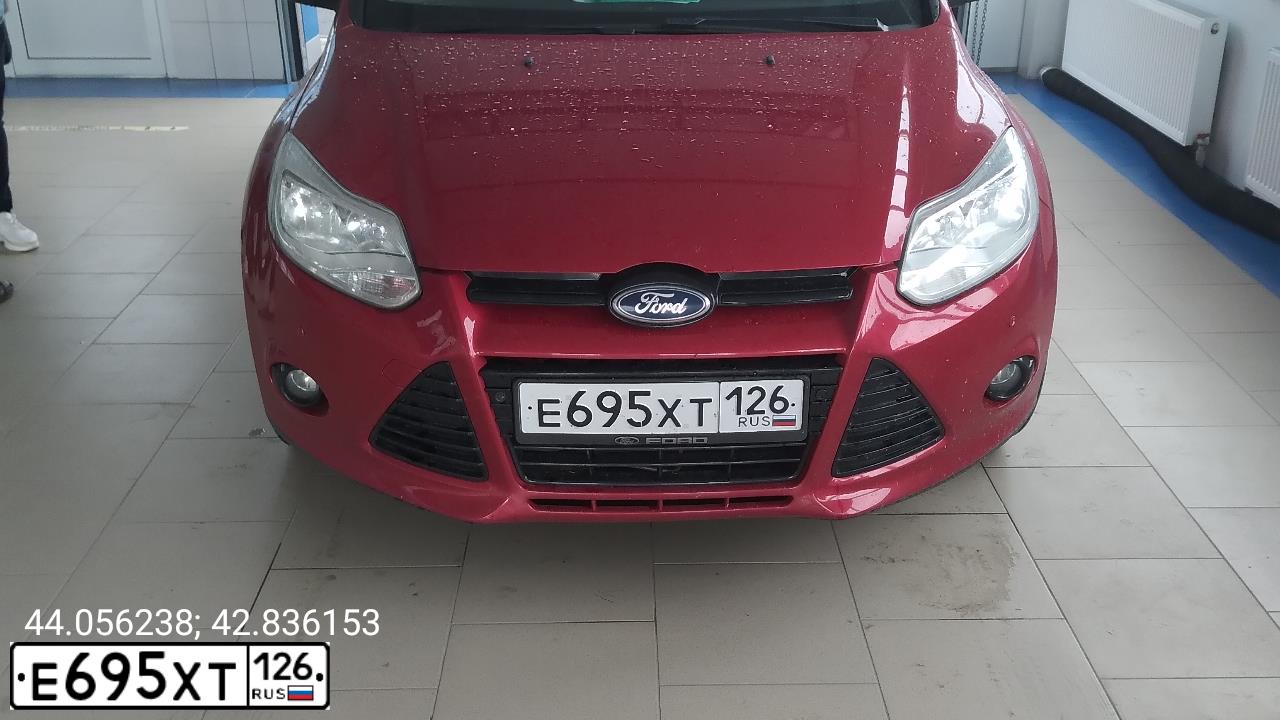 Фото автомобиля FORD FOCUS, 2013 — госномер К973СС123. Цвет: Красный