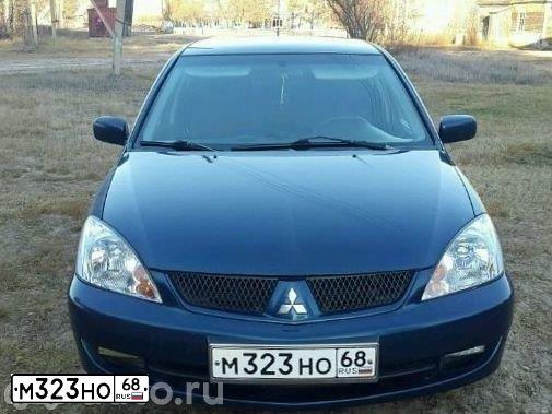 Фото автомобиля MITSUBISHI LANCER, 2006 — госномер М323НО68. Цвет: СИНИЙ