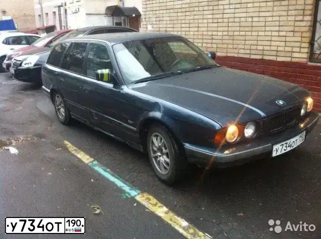 Фото автомобиля BMW SERIE 5, 1996 — госномер Т952АВ750. Цвет: СИНИЙ