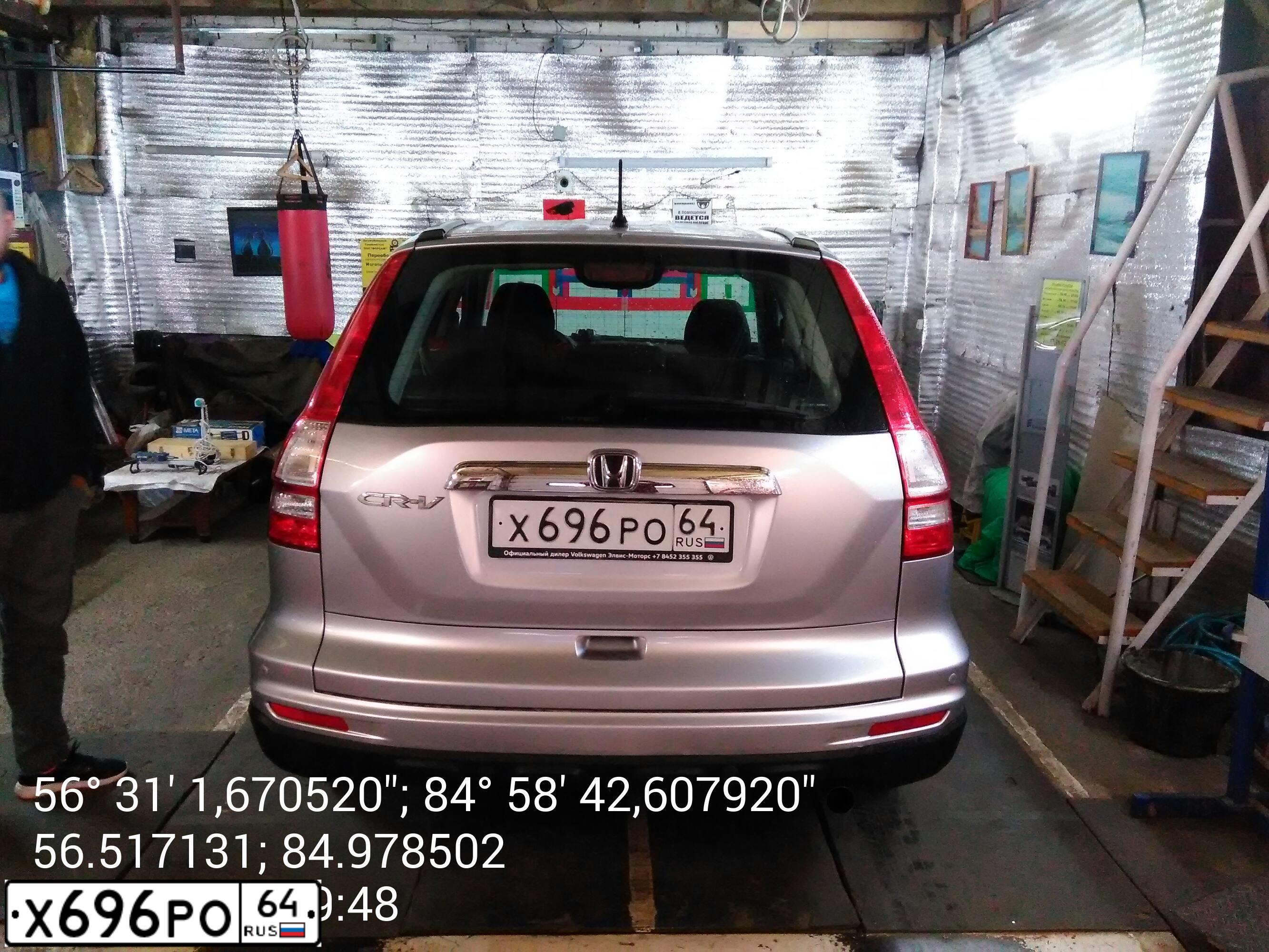 Фото автомобиля HONDA CR-V, 2012 — госномер Е850НР70. Цвет: Серебристый