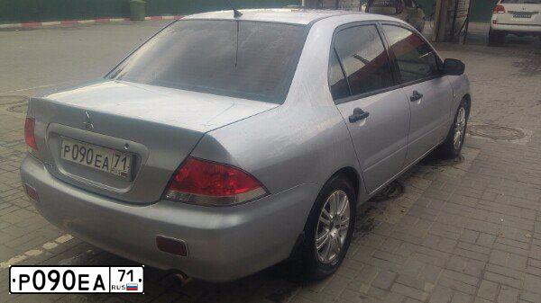 Фото автомобиля MITSUBISHI LANCER, 2003 — госномер Р090ЕА71. Цвет: Серебристый