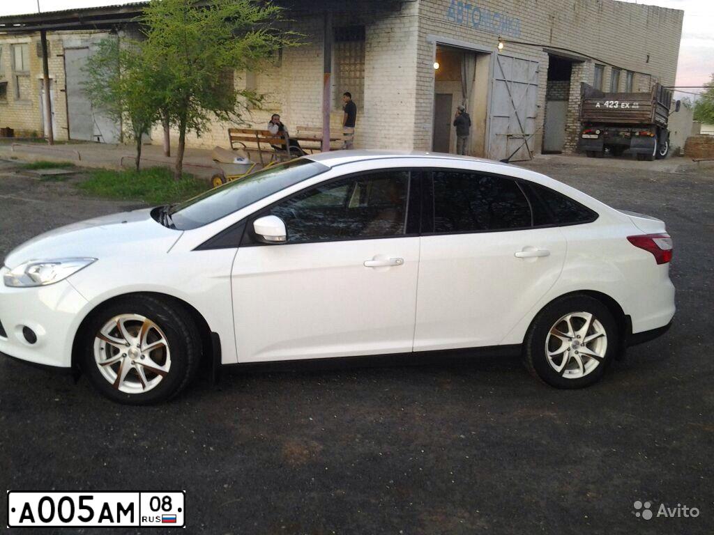 Фото автомобиля FORD FOCUS, 2012 — госномер В044РН134. Цвет: БЕЛЫЙ