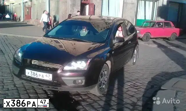 Фото автомобиля FORD FOCUS, 2006 — госномер Т158ТУ178. Цвет: ВИШНЕВЫЙ