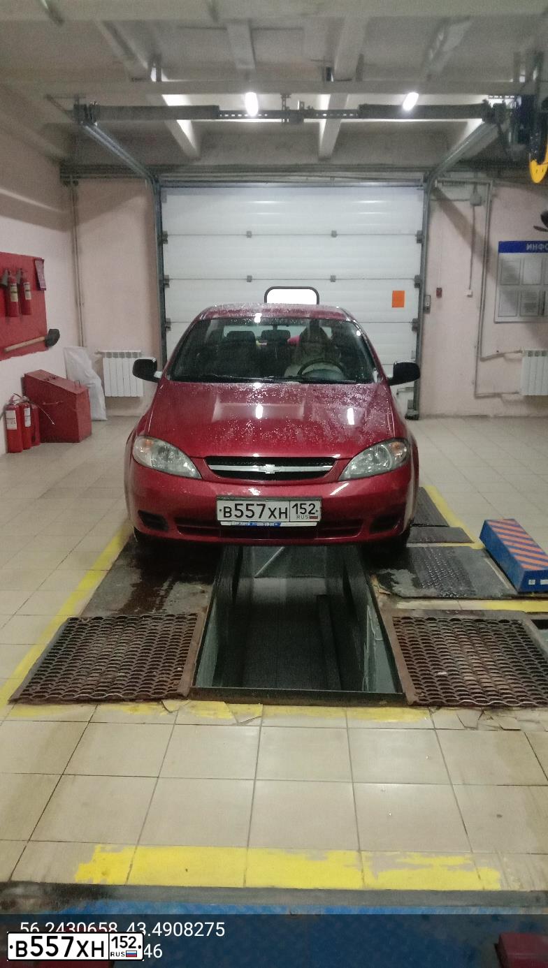 Фото автомобиля CHEVROLET LACETTI, 2010 — госномер В557ХН152. Цвет: КРАСНЫЙ